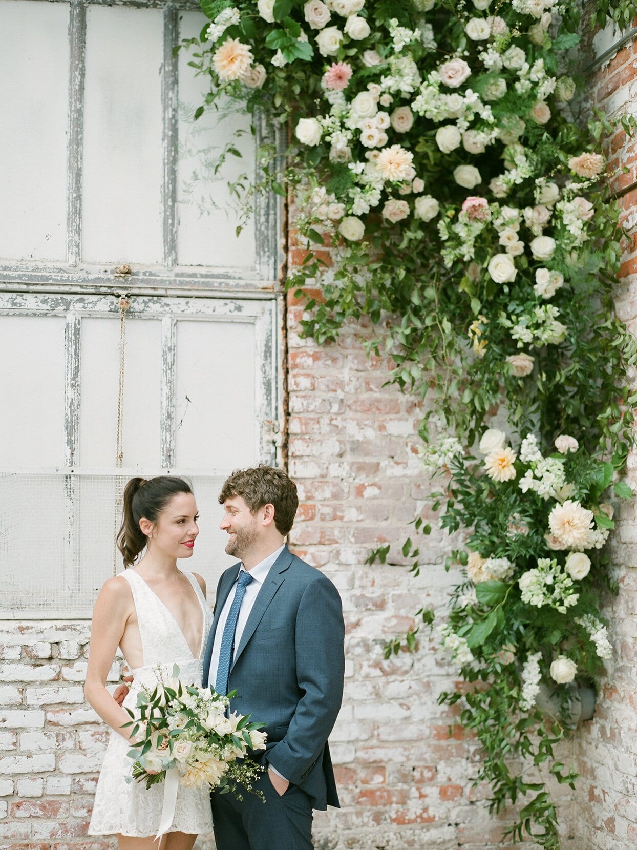 The Motto of This Intimate Industrial Warehouse Wedding? “Flowers Everywhere!”
