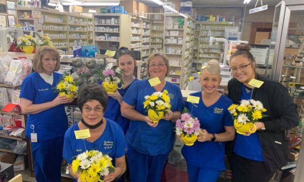 Florist Spreading Smiles by Gifting Flowers