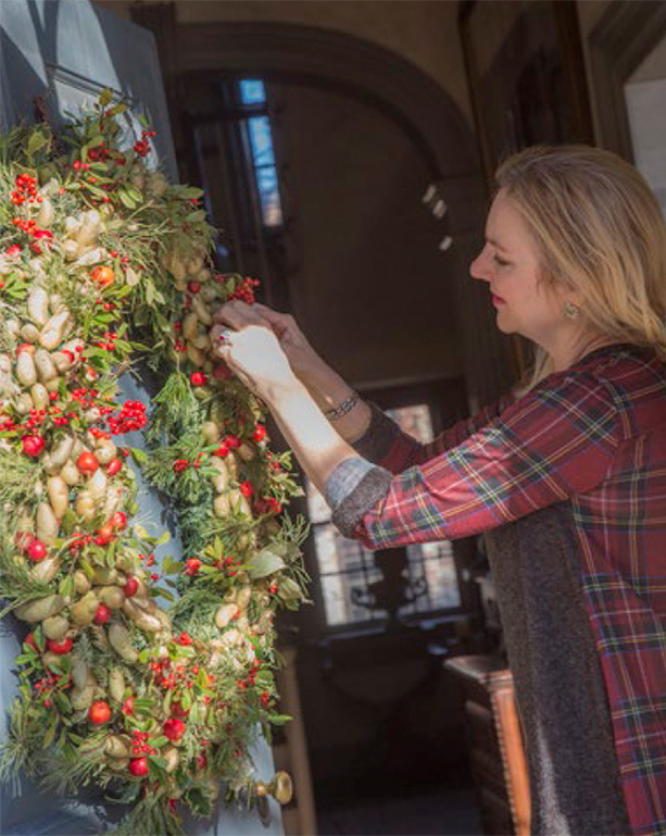 laura working on a wreath