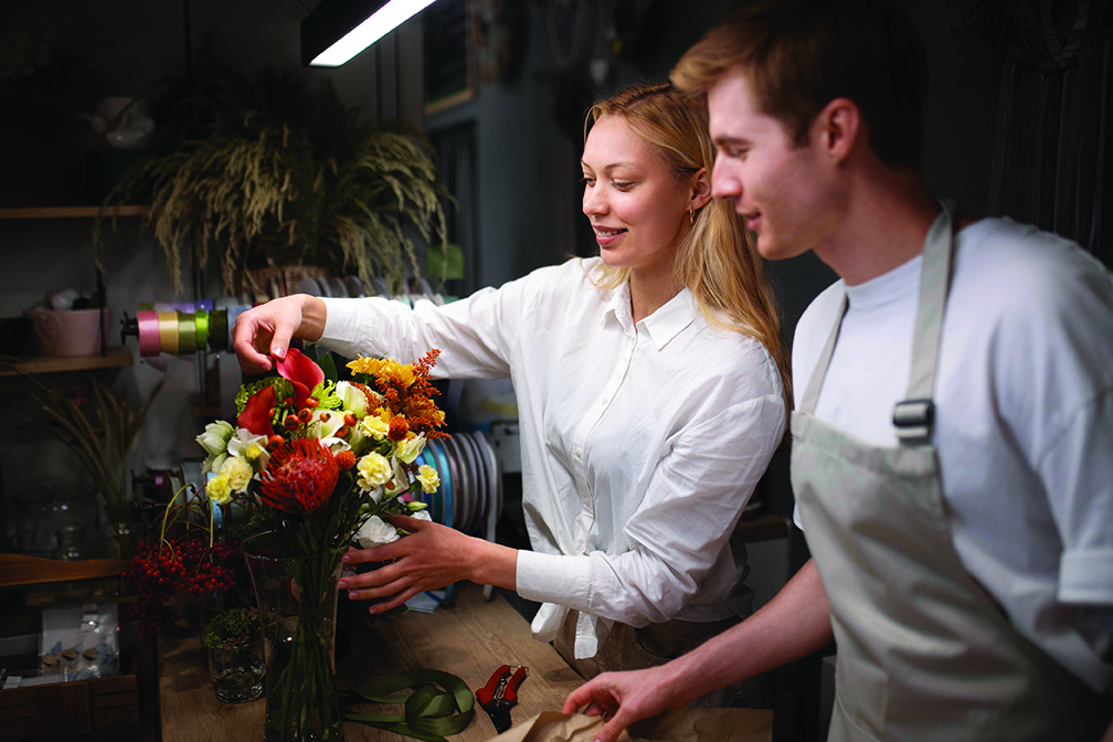 portrait-young-florists-working-together