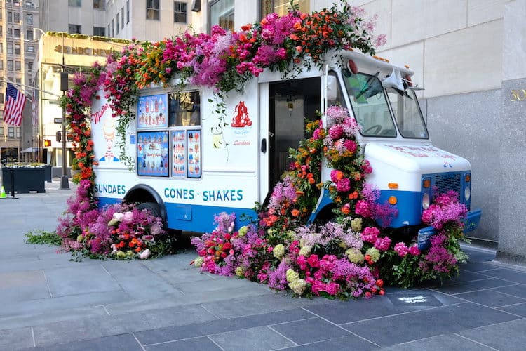 ice cream truck overflowing with flowers