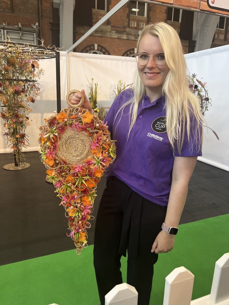 contestant holding bouquet