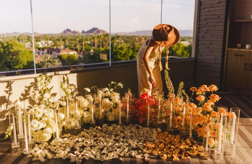 florist setting up floral installation