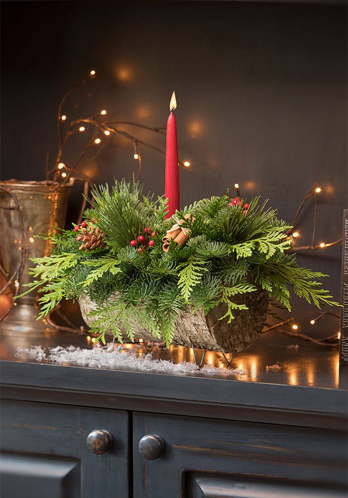 holiday centerpiece made with winter greens