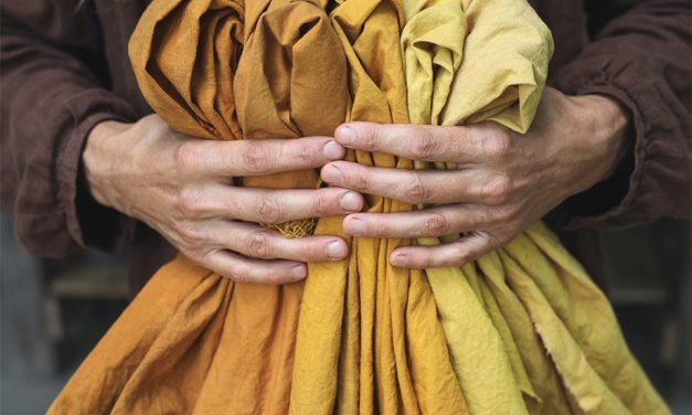 Quilter Using Natural Dye Made From Flowers