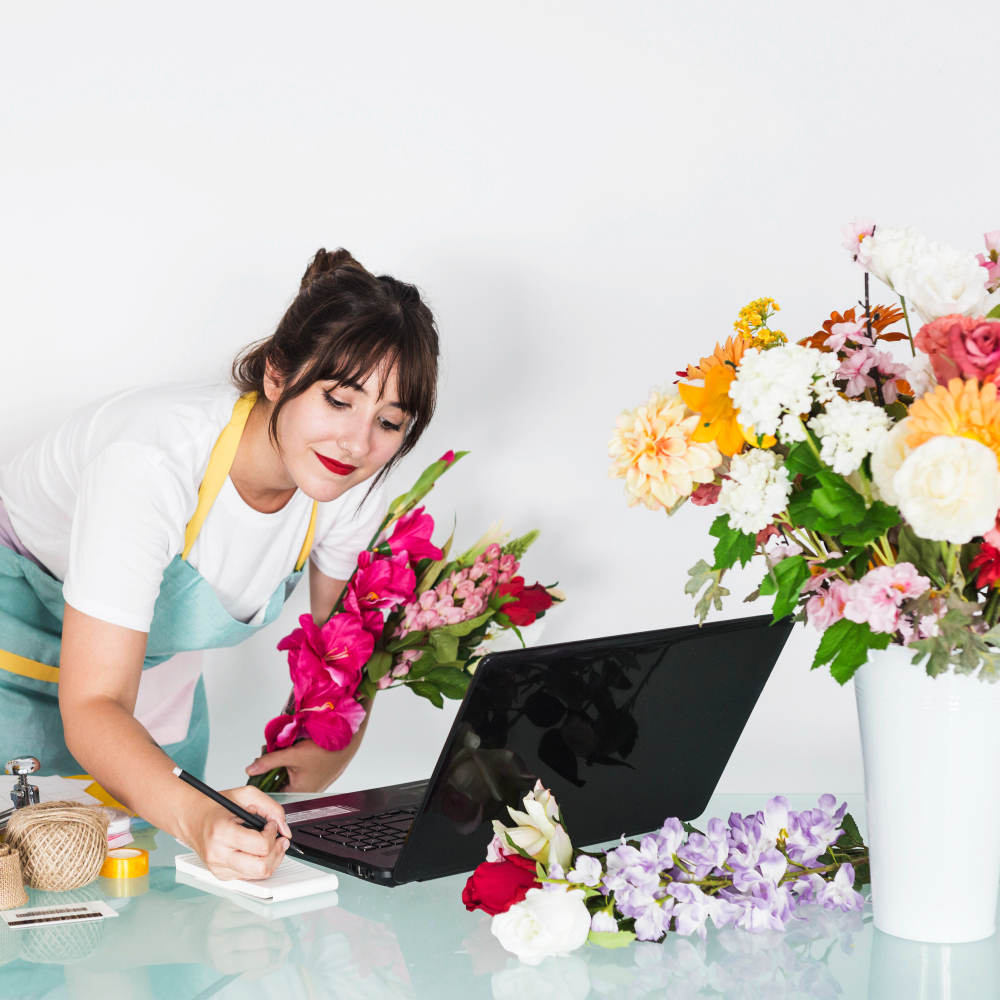 florist working by her laptop